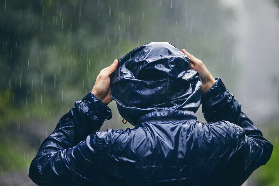 Traveler in heavy rain