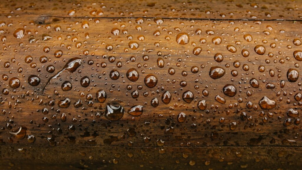 Drop of water on wood with raindrop